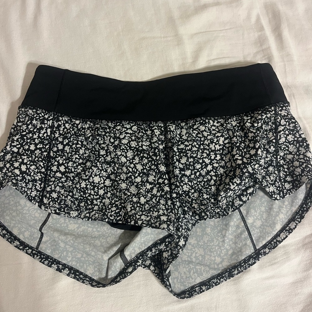 Lululemon size 4 speed up black and white shorts like new condition!